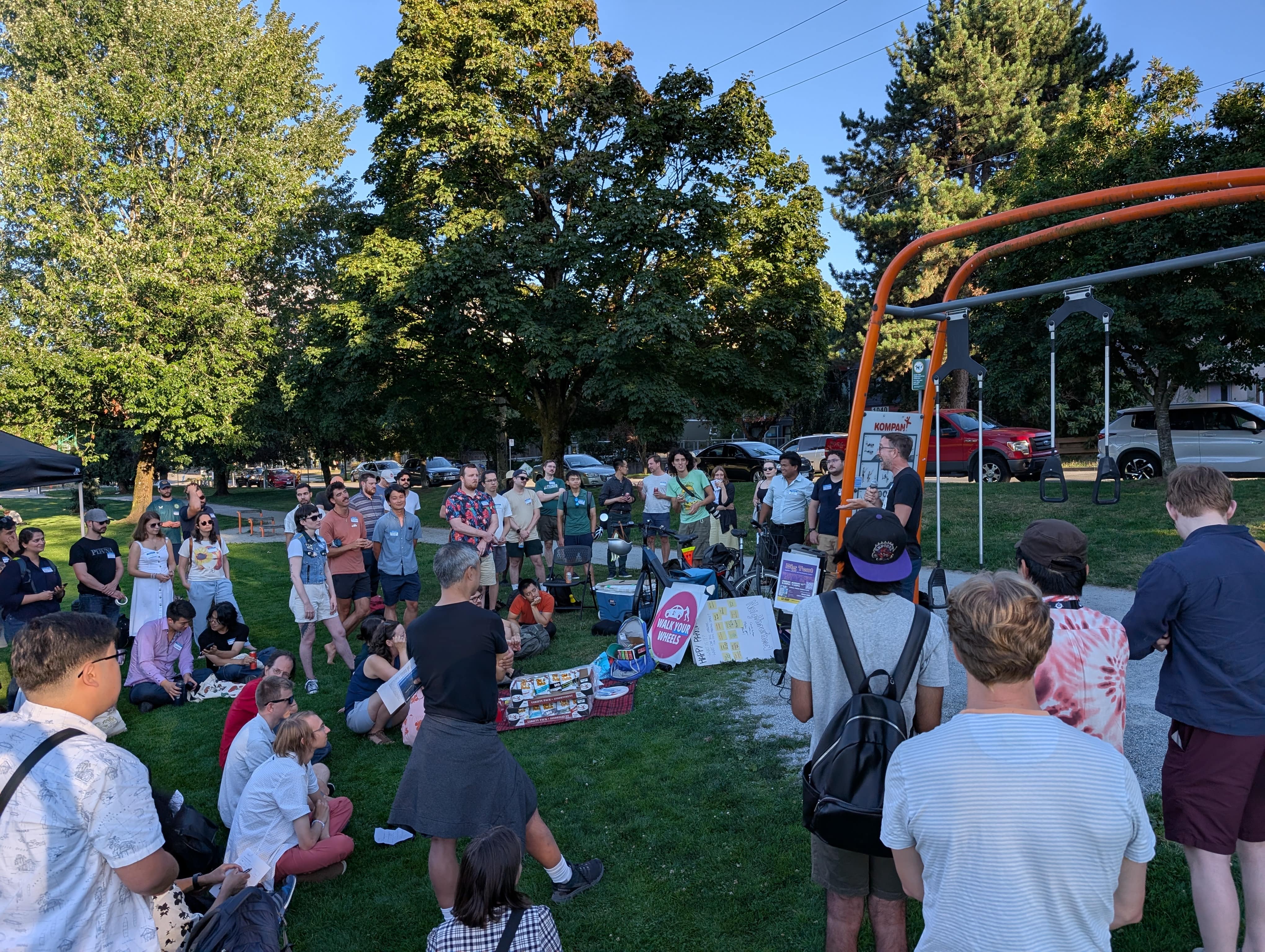 Norm Van Eeden Petersman of DelPOP / Strong Towns speaking at second Big Tent urbanist event in Aug 2025 at China Creek North Park in Vancouver, BC.